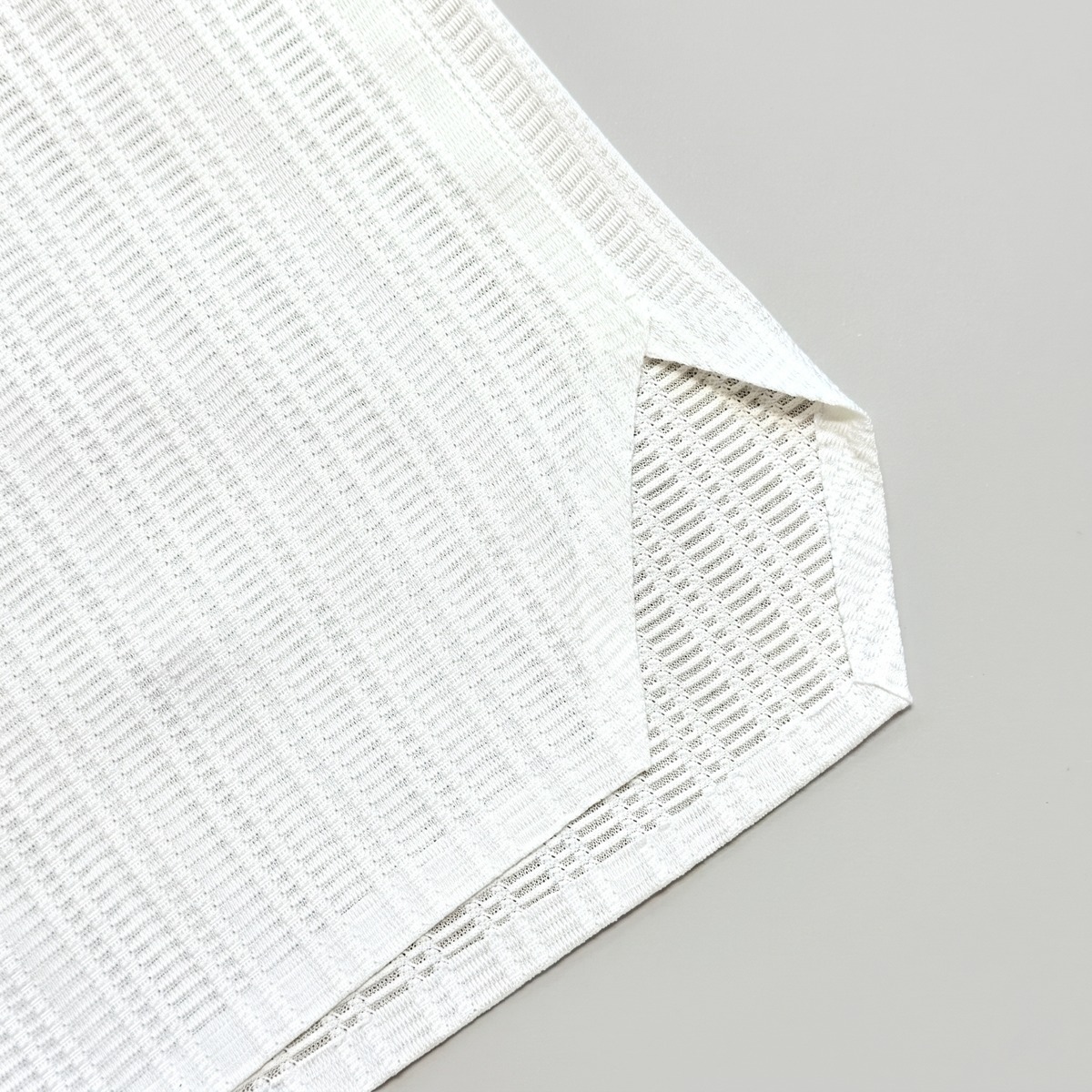 Fine-gauge sublimated mesh used in Printed Running Tee